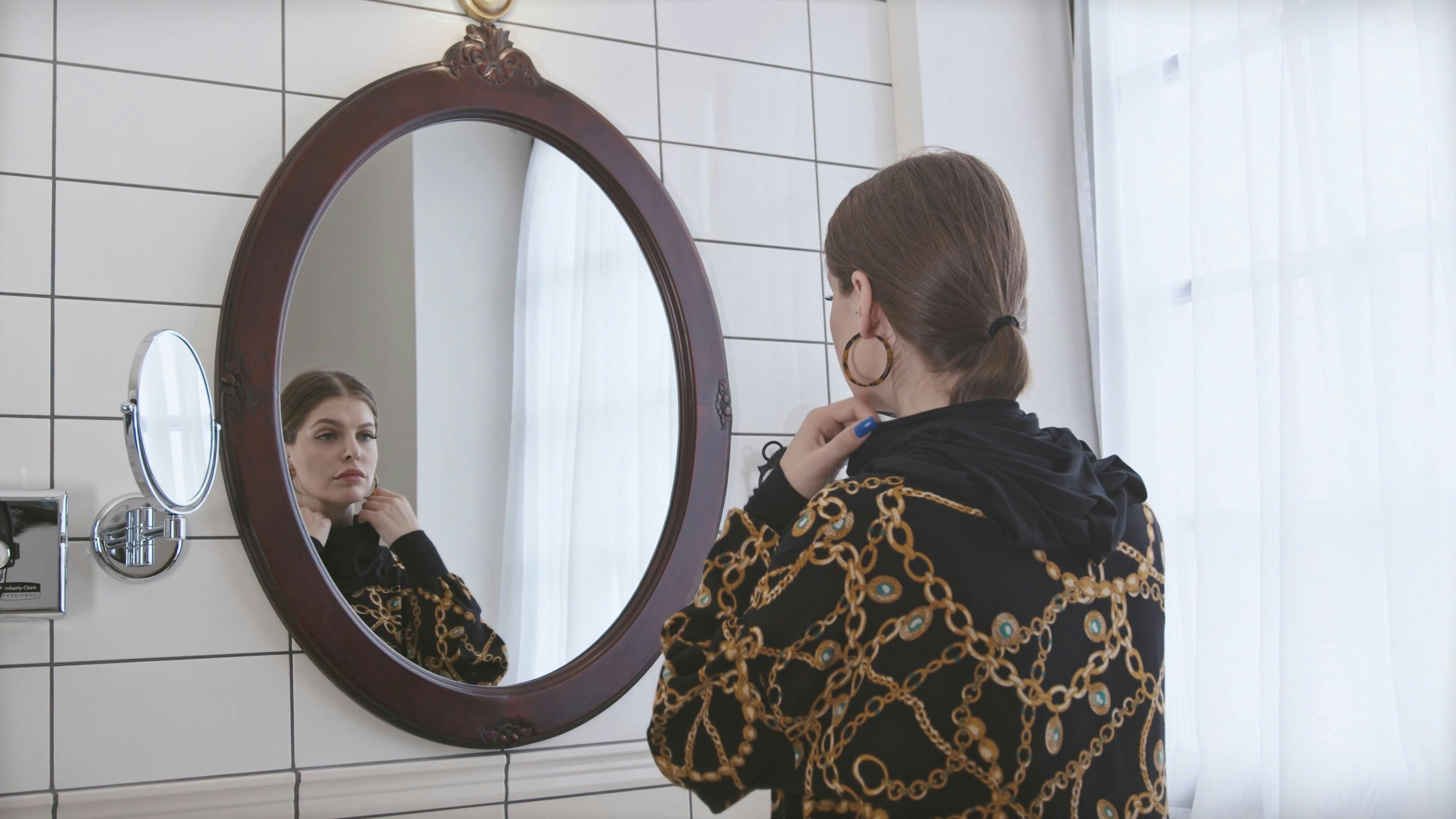 Woman Looking on Mirror · Free Stock Video