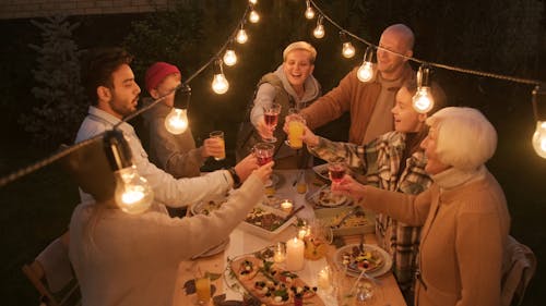 Joyful Family Toasting Drinks on Family Gathering