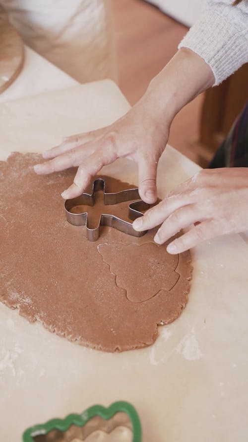 Person Using A Cookie Cutter 
