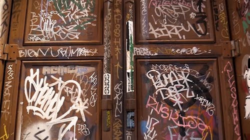 A Vandalized Wooden Door