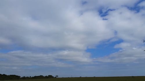 Time-Lapse Video of White Clouds in the Blue Sky
