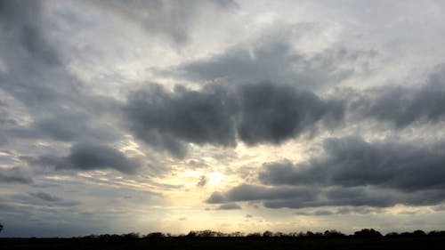 Clouds Formation In The Sky At Sunset