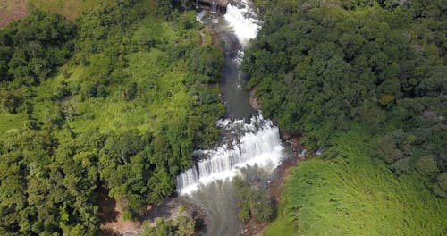 Drone Footage Of A Rapid River With Series Of Waterfalls