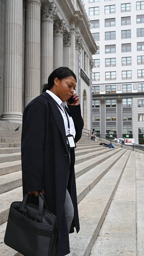 Woman Talking to a Phone