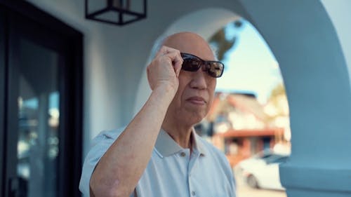 An Elderly Man Wearing His Sunglasses
