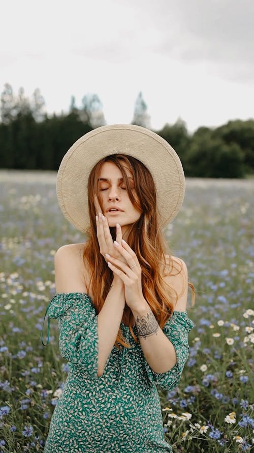 A Woman Pictorial In A Flower Field