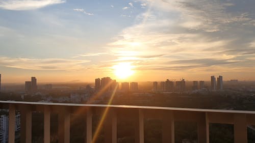 Sunset View From A Building Balcony