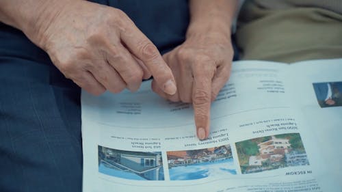 Couple Reading Newspaper