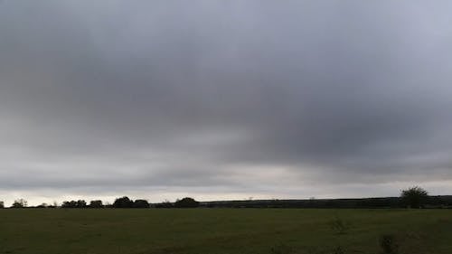 Time-Lapse Video of Grass Field and White Clouds in the Sky