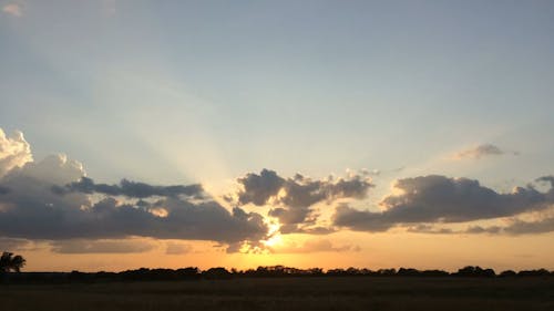 Time-Lapse Video of Grass Field During Sunset