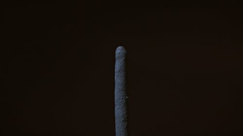 Close-Up View of a Burning Sparkler on a Black Background