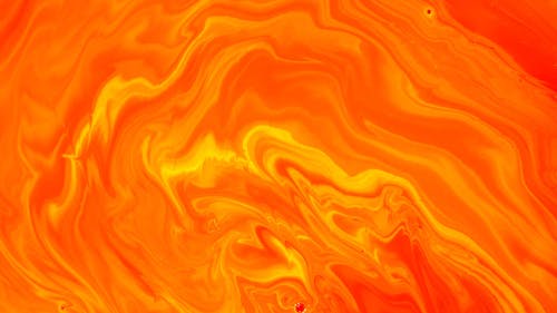 An Orange Liquid Paint in Motion