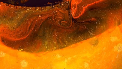 An Orange Liquid Paint in Motion