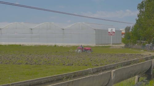 A Tractor on Agricultural Land