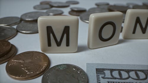 Close Up View of the Coins and Paper Bills