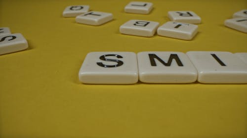 Forming The Word "SMILE"