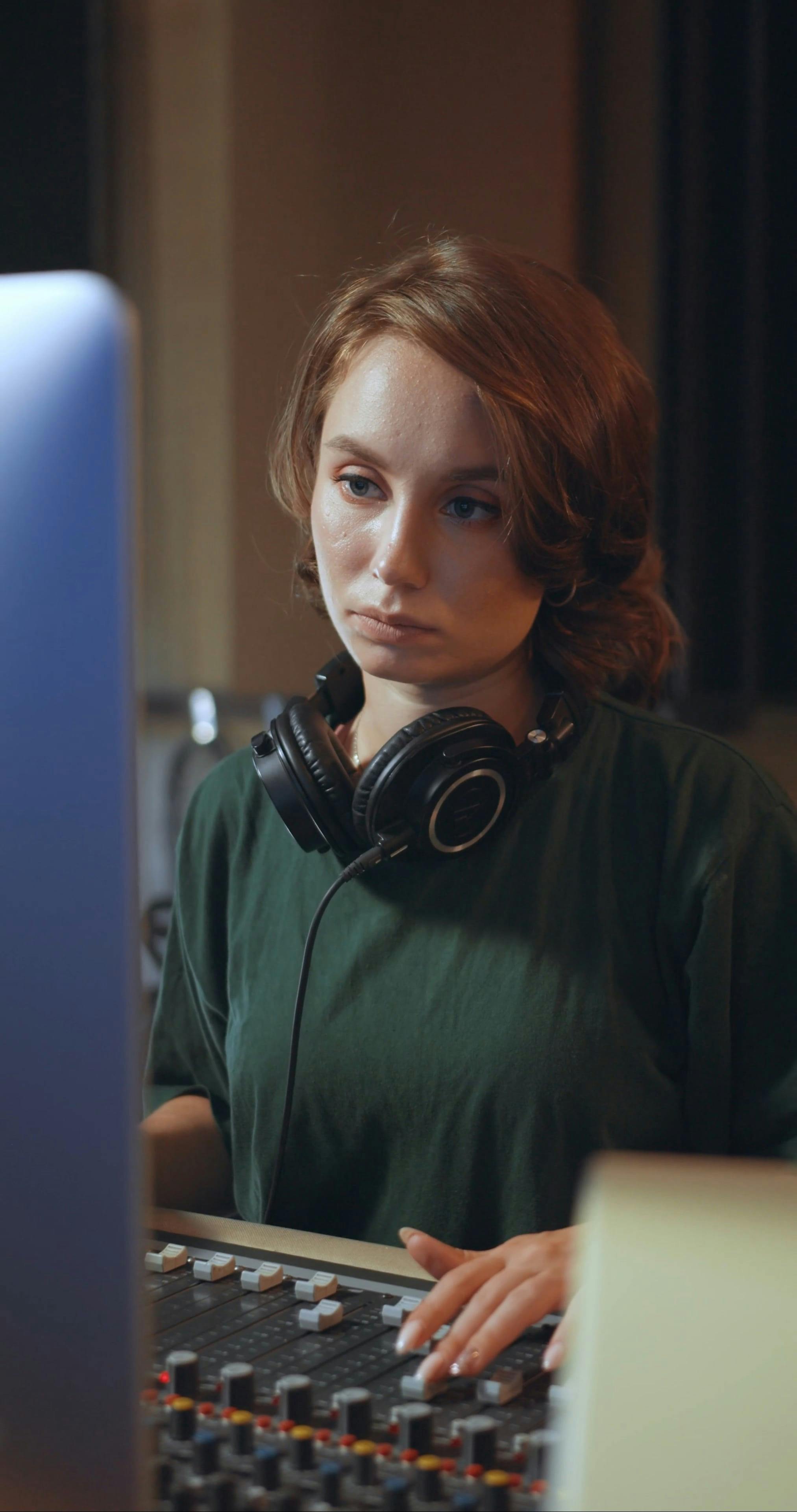 A Woman Working as a Sound Engineer · Free Stock Video