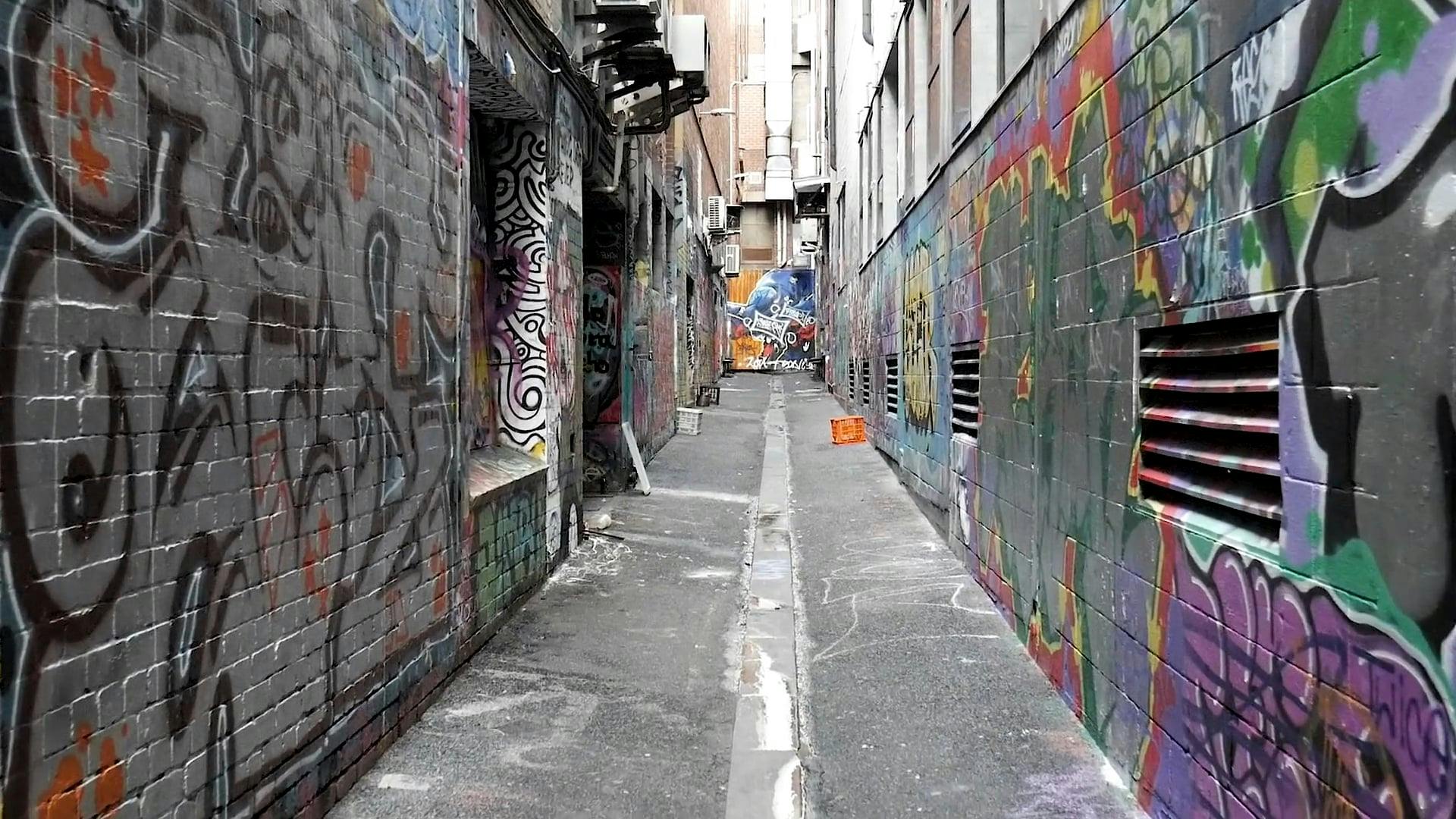 An Alleyway Full Of Graffiti Art On Wall Free Stock Video