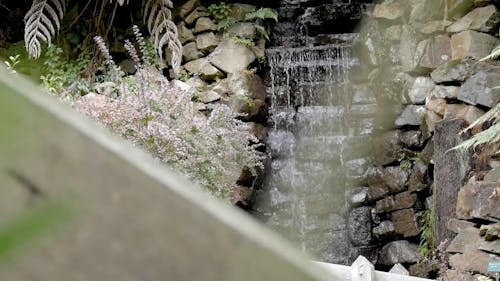 A Waterfall Cascading Down Symmetrical Stones