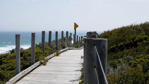 A Boardwalk Overlooking The Sea