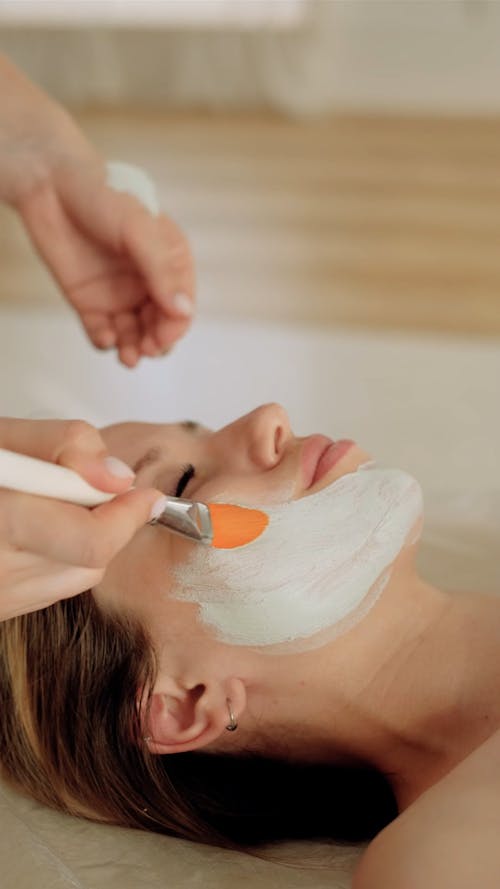 A Woman Getting a Facial Treatment