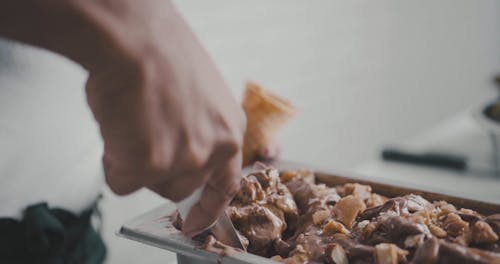 Woman Scooping Gelato