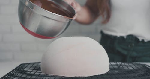 Person Pouring Chocolate