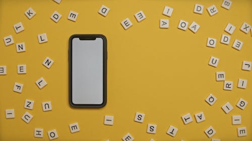 Smartphone Over A Yellow Surface