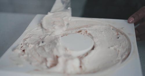 Person Molding an Ice Cream