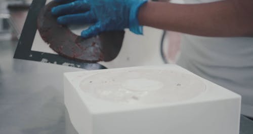 Person Preparing an Ice Cream