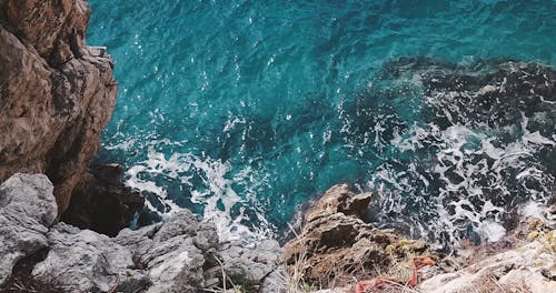 Sea Waves Erosion On A Cliff Coast