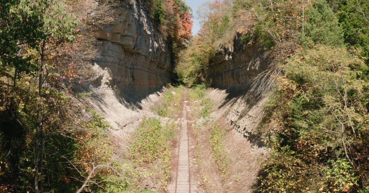 Path Between Two High Cliffs Aerial View of a Railway Track Between Two Cliffs · Free Stock Video