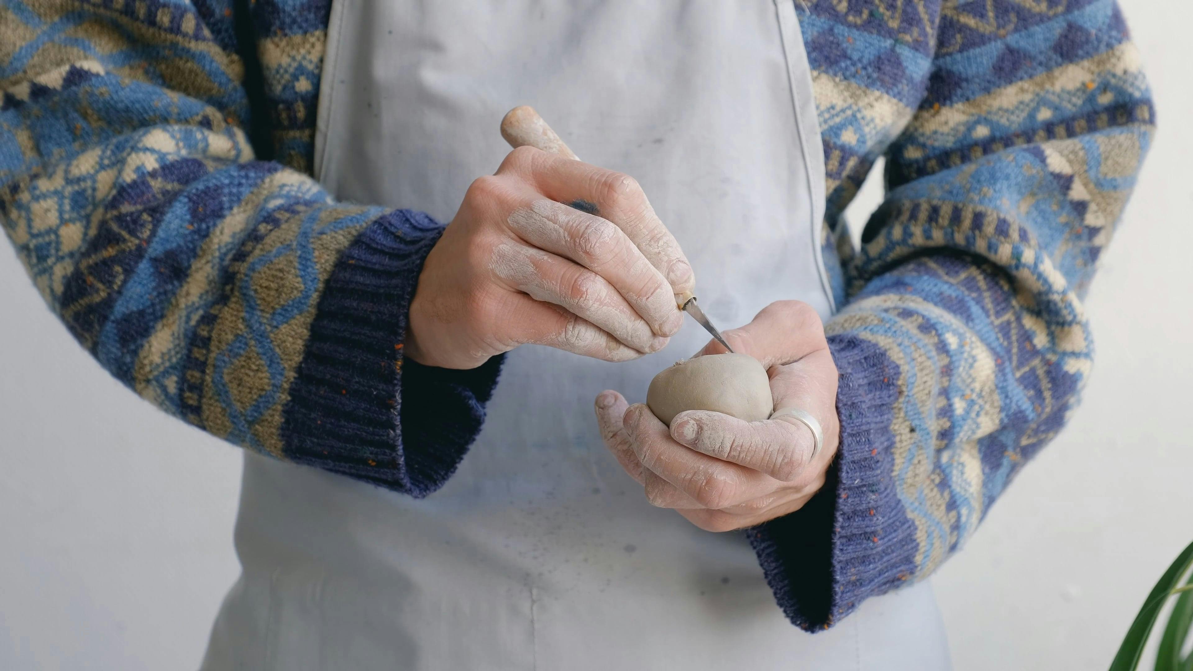 Person Sculpting a Clay · Free Stock Video