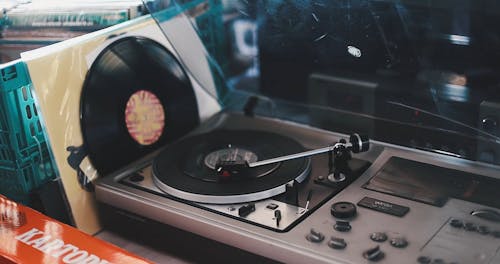 A Vinyl Record Playing on a Record Player