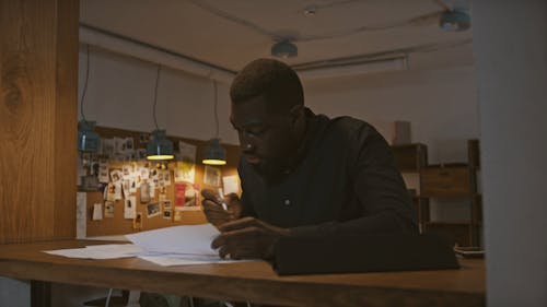 A Man Working in an Office