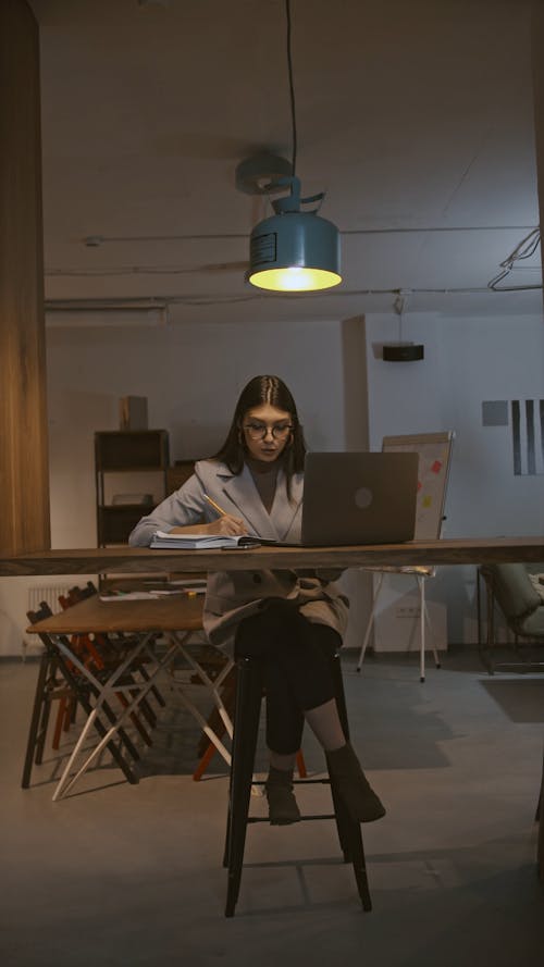 Woman Working Late on the Office