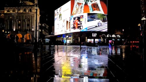 Advertising in a Street at Night 