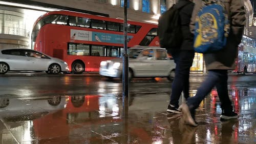 Buses and Cars by Night in the City Center 