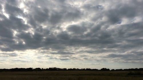 Timelapse Sunset in Cloudy Skies