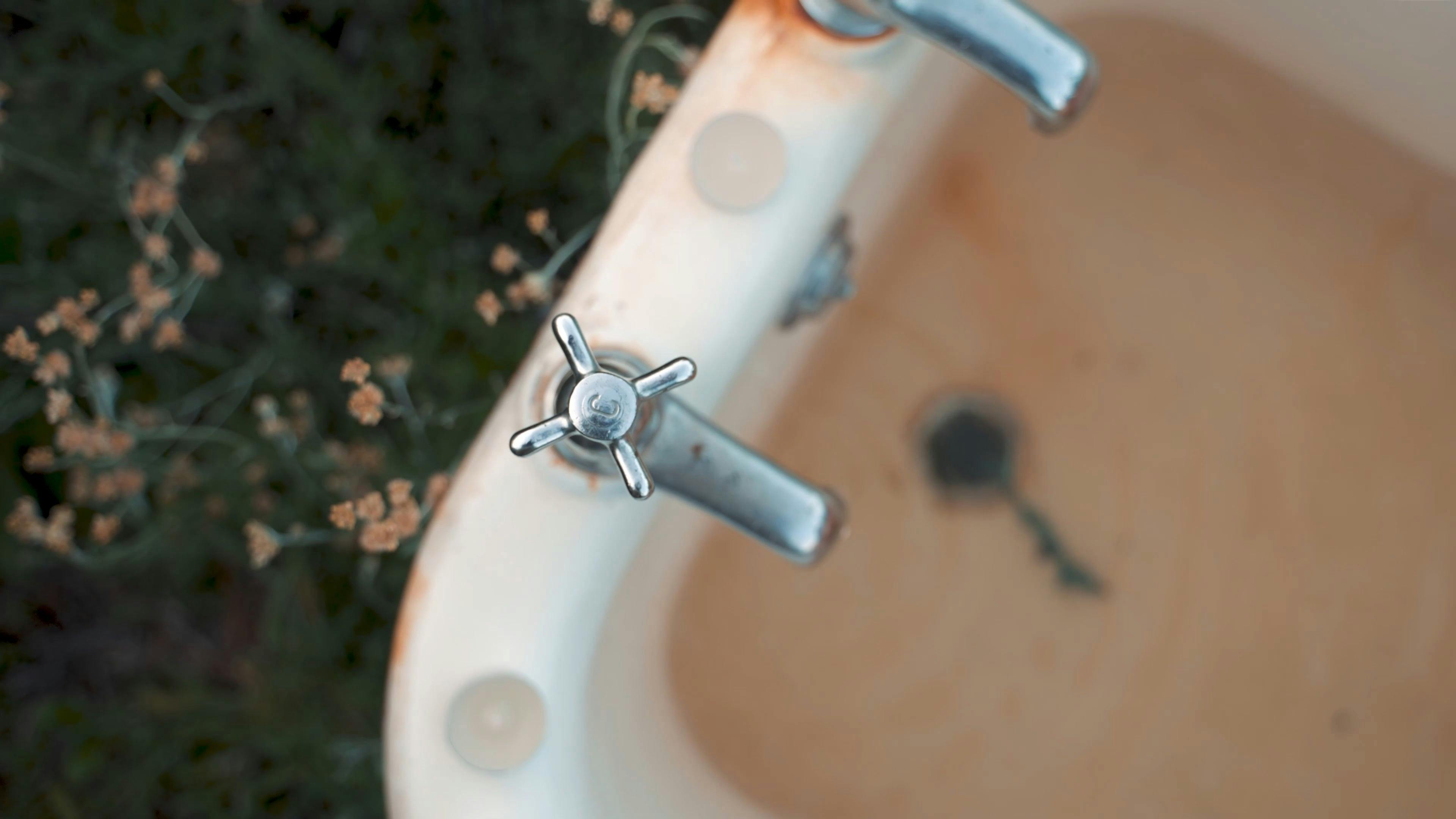 A Person Turning on the Faucet to Fill a Bath Tub · Free Stock Video