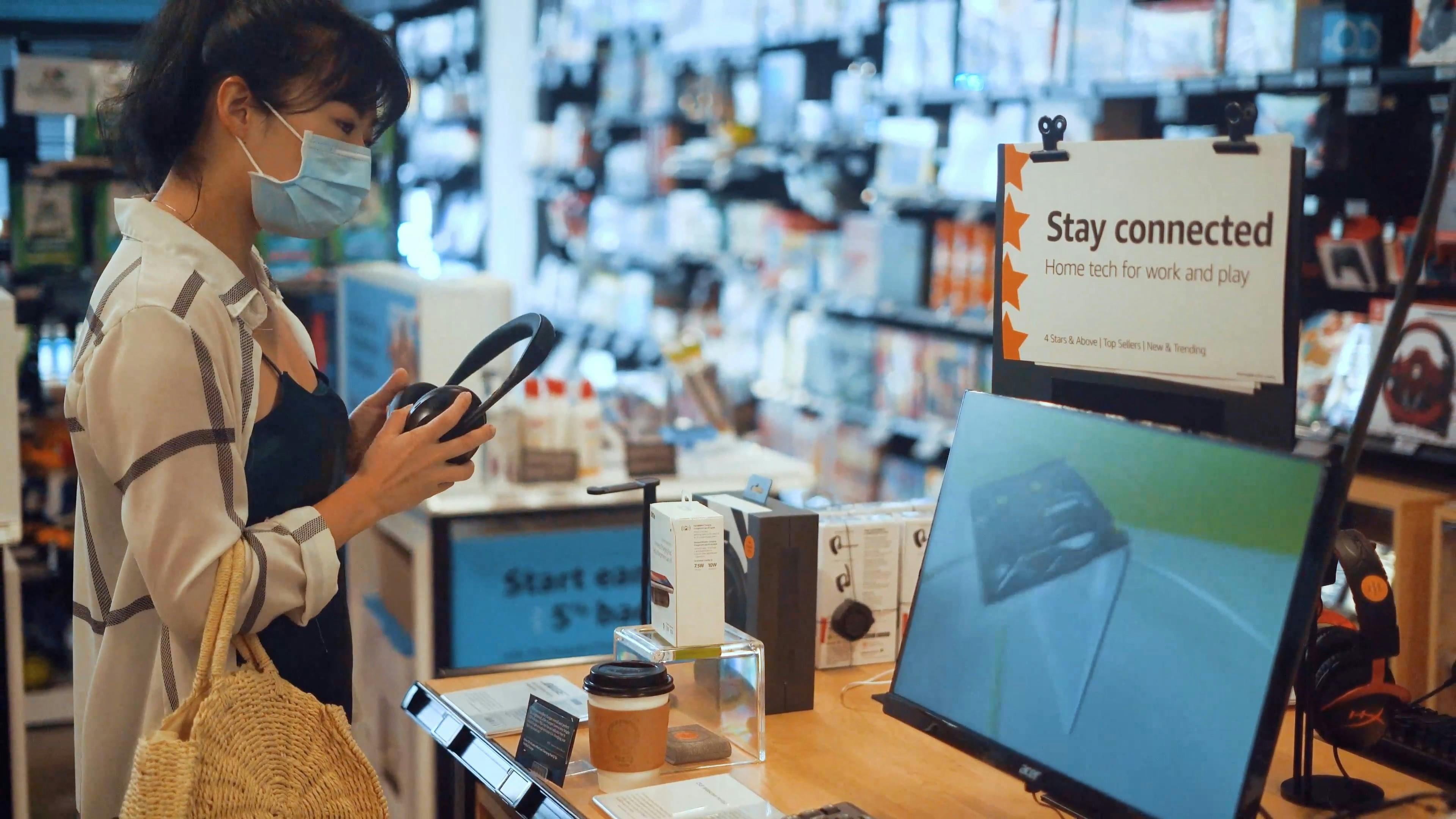 Girl with Face Mask in a Store · Free Stock Video