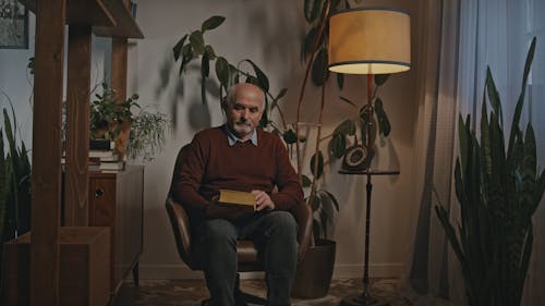 Video of a Man Reading a Book