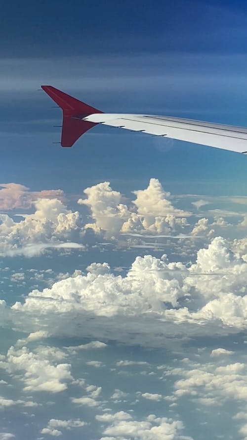 Window Plane View Above Clouds