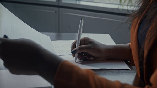 A Woman Doing Paperworks