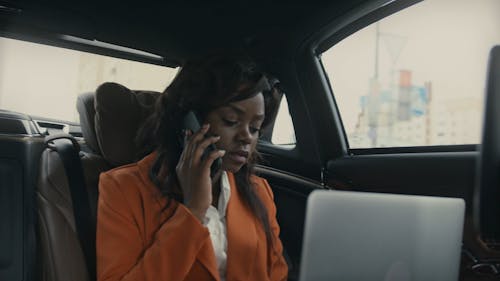 A Woman Working Inside A Car