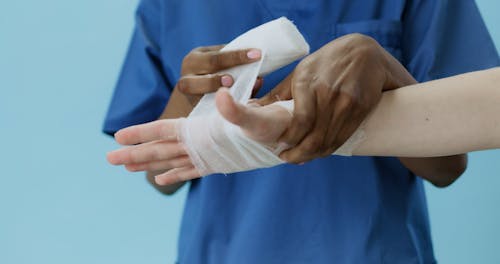 Person Putting a Bandage