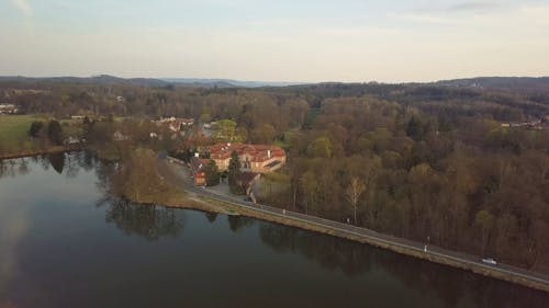 Aerial Footage of Houses in the Woods 