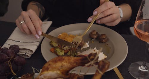 Woman Eating a Thanksgiving Dinner