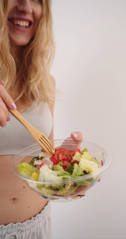 Woman Eating a Salad 