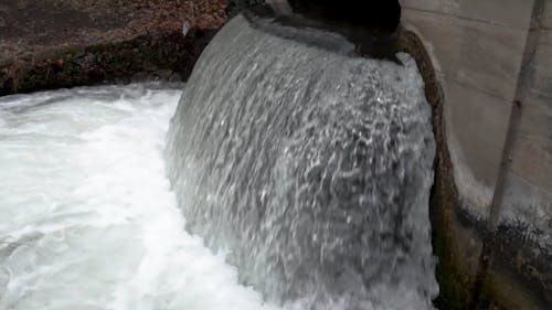 Water Coming Out of a Bridge